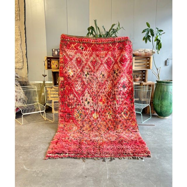 This exceptional vintage Moroccan Beni M'Guild rug is a large handwoven Berber carpet from the Middle Atlas Mountains of...
