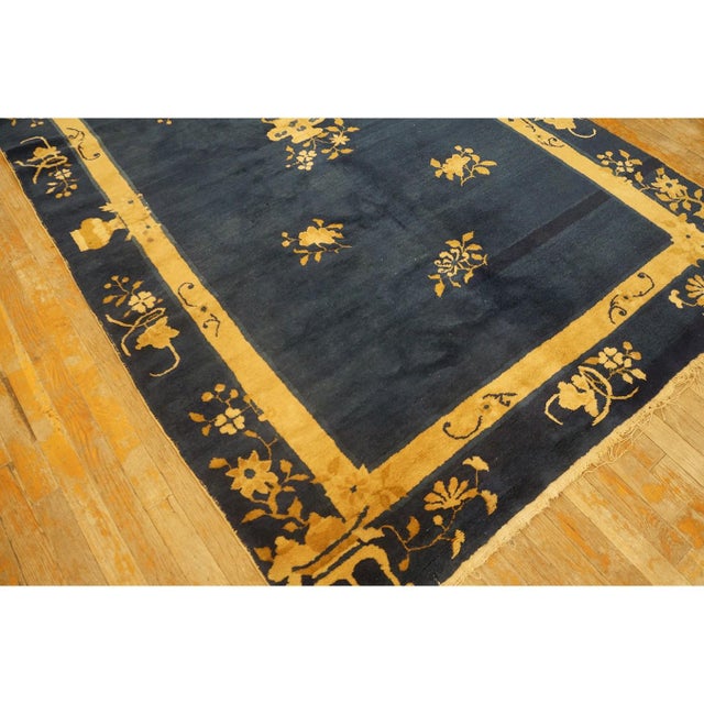 Antique Chinese - Peking Chinese Allover Floral Blue 1920s Rug, Circa Date: 1920s. This exceptional example of early 20th-...