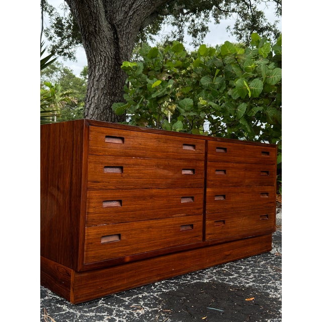 A beautifully crafted Danish Modern dresser designed by Poul Hundevad, this exceptional piece showcases the timeless...