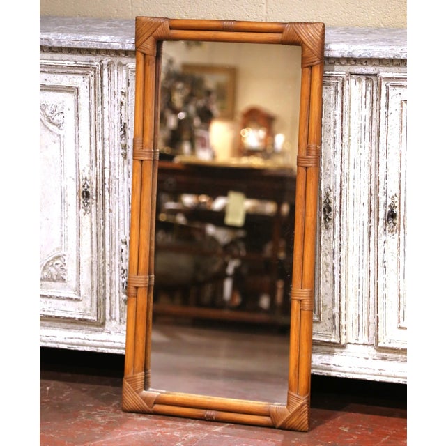 Decorate a powder room, hallway, or bedroom with this elegant antique wall mirror. Crafted in France circa 1920, the...