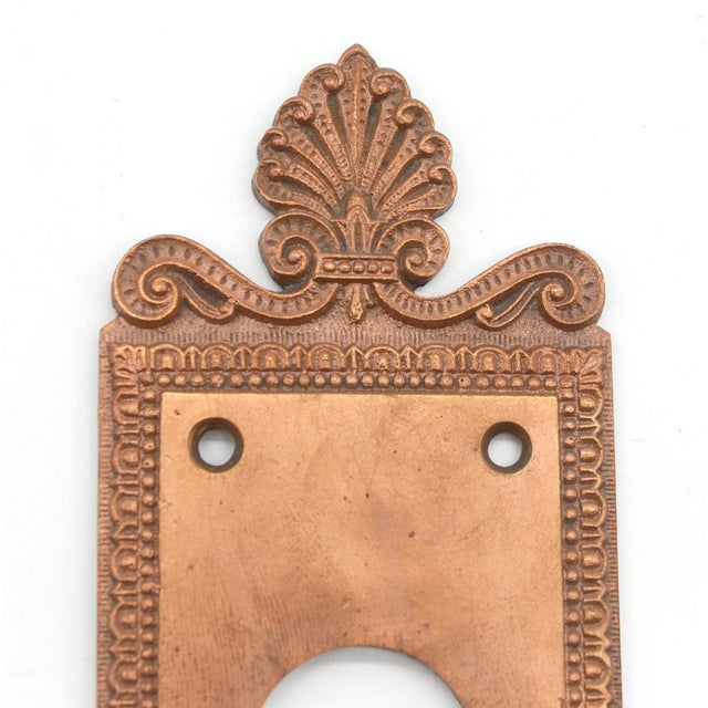 Greek style copper plated brass back plate made by Sargent in the 1910s catalog. It is part of the L-16300 Royan group....