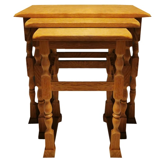 Nesting Tables in Oak with Carvings attributed to Henry Kjærnulf for Nyrup Furniture Factory, Denmark, 1960s, Set of 3 For Sale