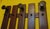 Mid century large wall mounted coat and hat rack in stained wood, 1960s, with 3 large coat holders and 10 smaller ones.