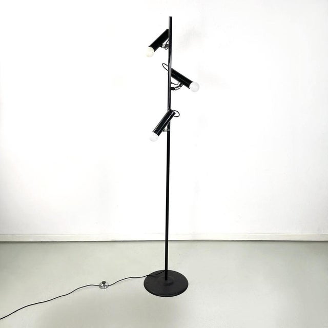 Italian modern Adjustable 3 lights floor lamp P393 by Luci in black metal, 1970s Floor lamp mod. P393 with 3 adjustable...
