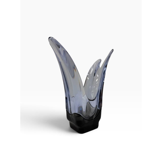 Add a touch of mid-century organic elegance to your tabletop with this striking Tiffin Glass Company flared vase from the...