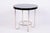 This elegant round Bauhaus style table comes from Czechoslovakia from the first half of the 20th century and was...