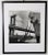 Attractive black and white matted photo of and Anchored Ship and Historic Bridge in plastic frame with plexiglass. No...