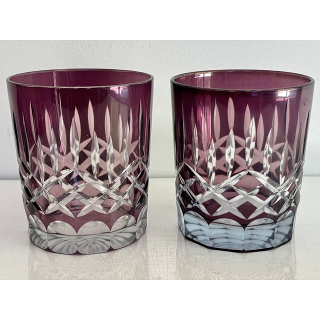 Vintage amethyst crystal pair of rocks glasses, likely by Hungarian Ajka Crystal. Hand-cut facets catch the light...