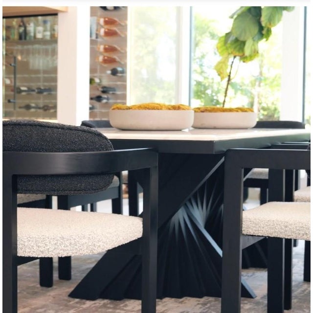 Sophisticated materials take a cue from modern geometry to create this spectacular dining room set for 6 people. Black...