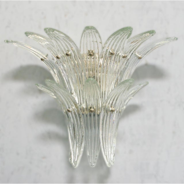 Italian Palmette wall light shown with 12 clear Murano glass leaves in the style of Barovier mounted on chrome finish...