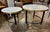 Sleek set of black steel and brass nesting tables marble tops. Adds a touch of elegance and style to your decor. Mixes...