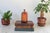 Vintage hand-turned wooden lidded jar, featuring inlaid geometric designs. No makers mark. Lid does not sit flush.