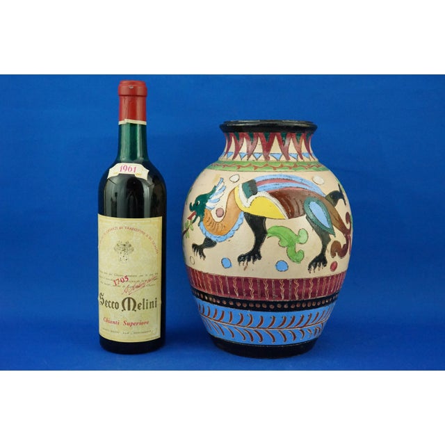 Item description: Beautiful ceramic vase, entirely hand-modeled on a potter's wheel and decorated with scratched geometric...