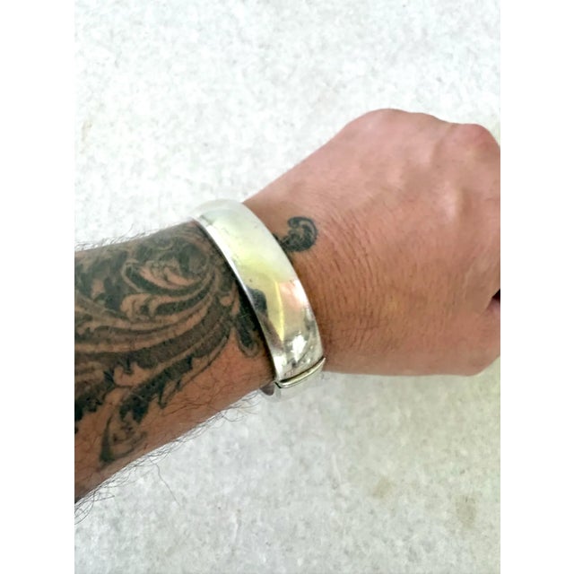 Lovely, vintage, nice quality sterling silver bangle bracelet with hinge, clasp, sleek modern design. Fit medium men or...