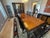 1980s vintage chin hua style dining room table and chairs, including the extra leafs and 10 chairs. This table setting...