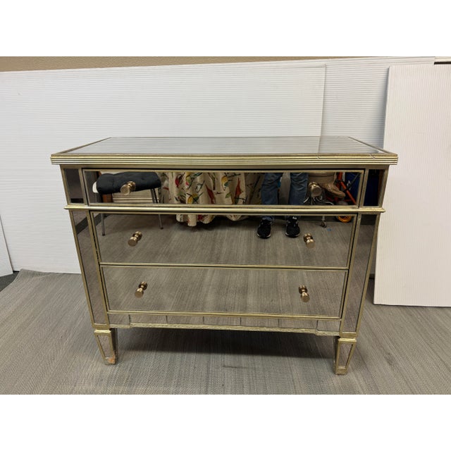Design Plus Gallery presents the Azil Mirrored Chest of Drawers from Rosdorf Park. The chest offer sophisticated...