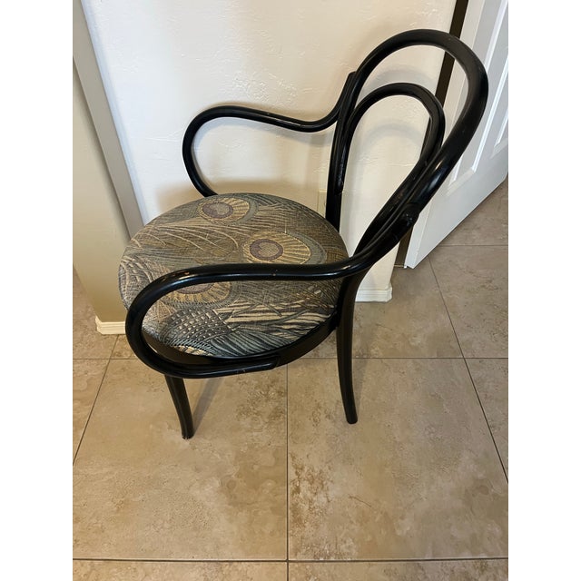 This chair is a vintage bentwood armchair, by Shelby Williams. This is a design famously pioneered and popularized by the...
