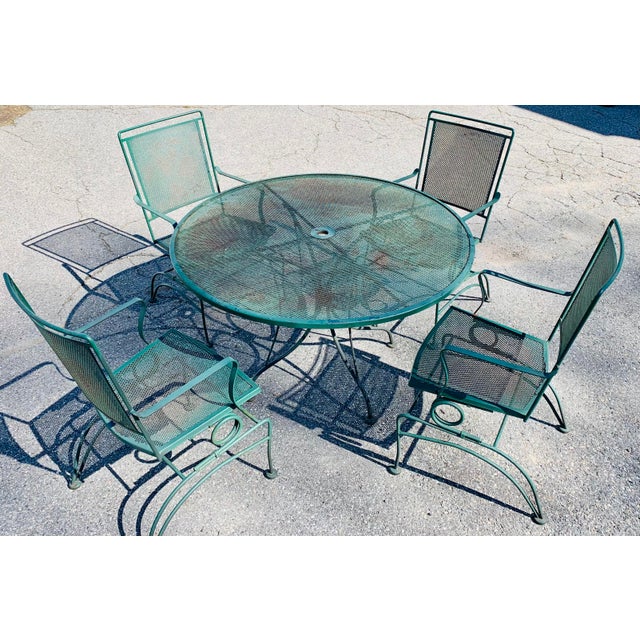 Vintage Wrought Iron Patio Furniture Dining Set Set consists of 4 Rocker Bouncer Spring Chairs 1 Mesh 48 inch round table...