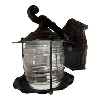 Circa 1920’s Hammered Iron and Brass Glass Jar Outdoor Wall Sconce For Sale