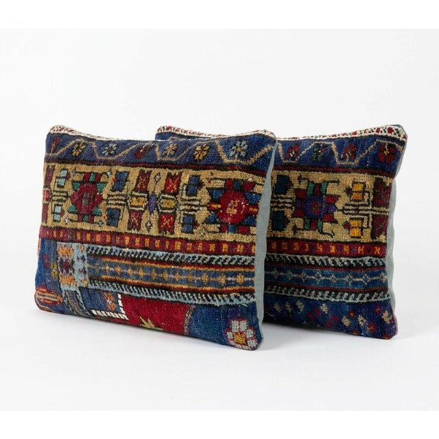 This beautiful 16'' x 24'' pillow cover set was made from authentic Turkish rug pieces. Bright colors of wool adorn the...
