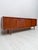 Elegant danish sideboard designed by axel christensen for aco møbler during the 1960s. Crafted in teak, the piece features...