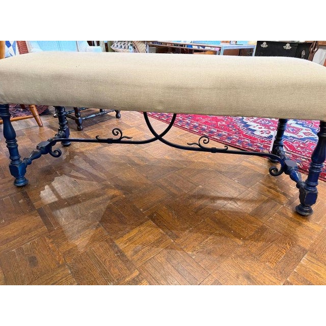 This amazing hand crafted original blue painted wood & hand forged iron connector below the seat.This bench is in fine as...