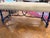 This amazing hand crafted original blue painted wood & hand forged iron connector below the seat.This bench is in fine as...