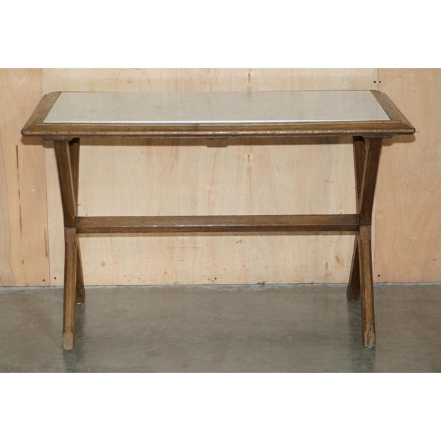 Absolutely stunning English Oak and Italian Carrara Marble Cotswold style small four person dining table with X-framed...