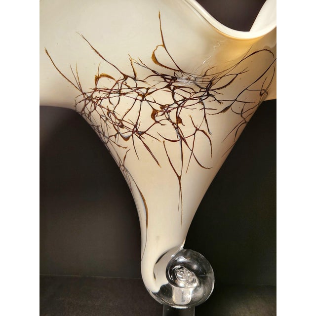 Infuse your space with dramatic Postmodern elegance with this commanding 12-inch hand-blown art glass vase, meticulously...