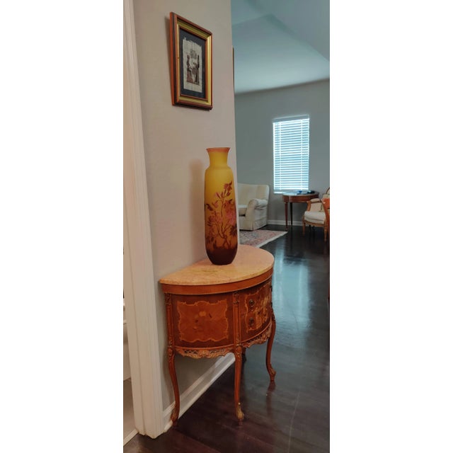 Beautiful inlaid with wood design. 2 drawers Original marble tops Demi lune H: 31" W: 31 D: 15