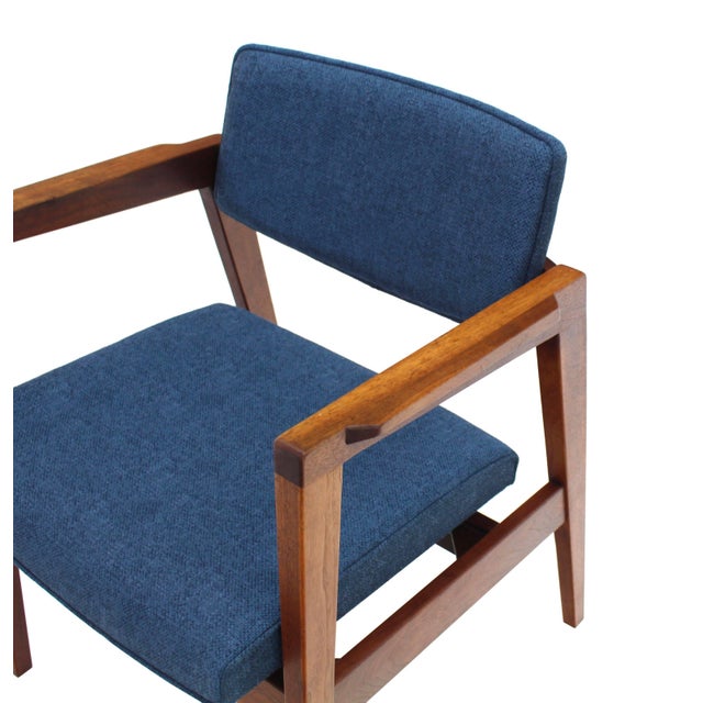 Very nice set of four Mid-Century Modern newly upholstered solid walnut gunlock chairs in Risom style.