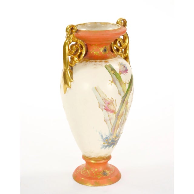 This exquisite 19th-century German vase, crafted from Royal Bonn china, epitomizes the beauty and elegance of antique...