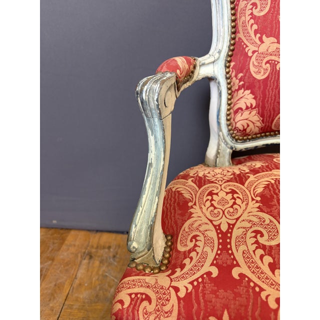 Pair of cabriolet chairs in polychrome beechwood, white and light blue, seat height 45 cm, upholstery and padding in very...