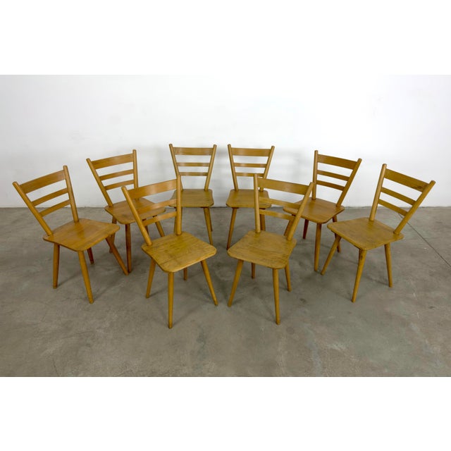 Dimensions: H 33” x W 15.7” x SD 16.7” x SH 18.7” Set of 8 Vintage ladder back German Bistro dining chairs with tapered...