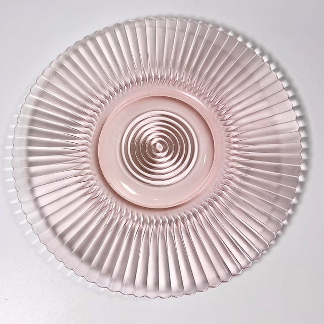 Vintage Home is pleased to present this Art Deco Depression Era Pink Glass Starburst Charger. This is a beautiful example...