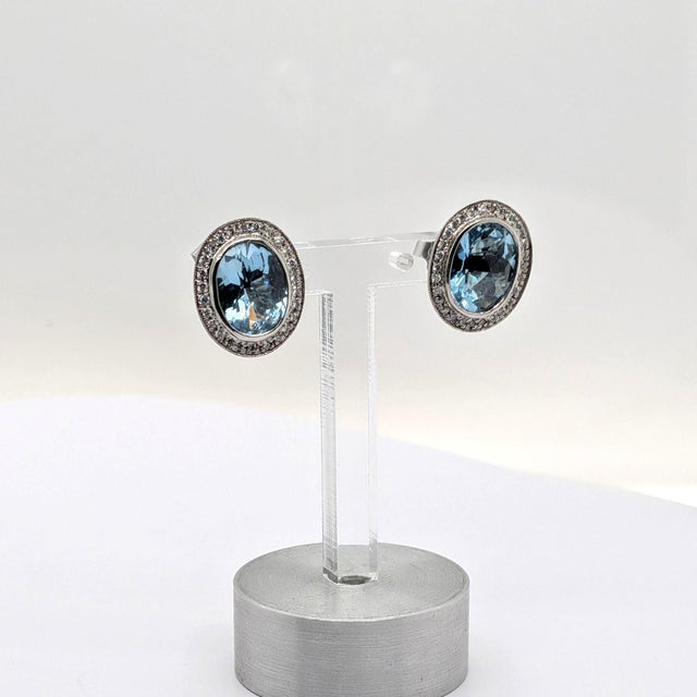 Stone Information - --------------------------------------------- Primary Stone(s): Aquamarine - Stone Grading: - Color:...