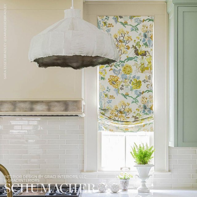 A fanciful, ever-popular design meticulously printed by hand with the same 112 blocks used to make the pattern in the...