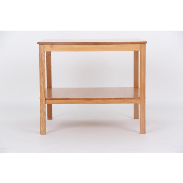 Kaare Klint designed the beautiful smoking and coffee table around 1932. The table is made of solid elm wood and has a...