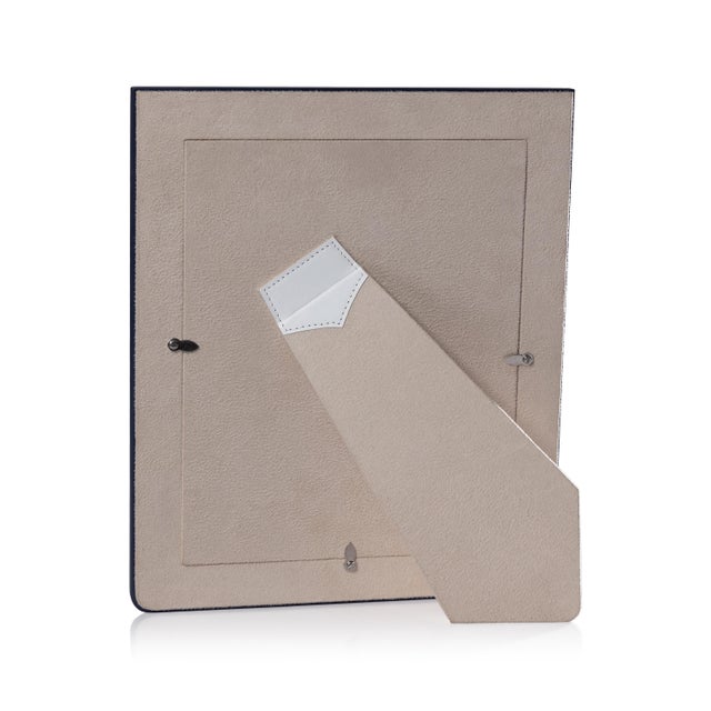 A sophisticated two-tone leather photo frame designed to showcase memories with style. Crafted from genuine Nappa leather,...