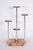 This sophisticated plant stand from the 1930s, originating from Czechoslovakia, carries the signature of the interwar...