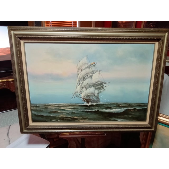 The W.Sopia Original Nautica Painting is a large framed canvas artwork by artist W. Sopia. This contemporary seascape...