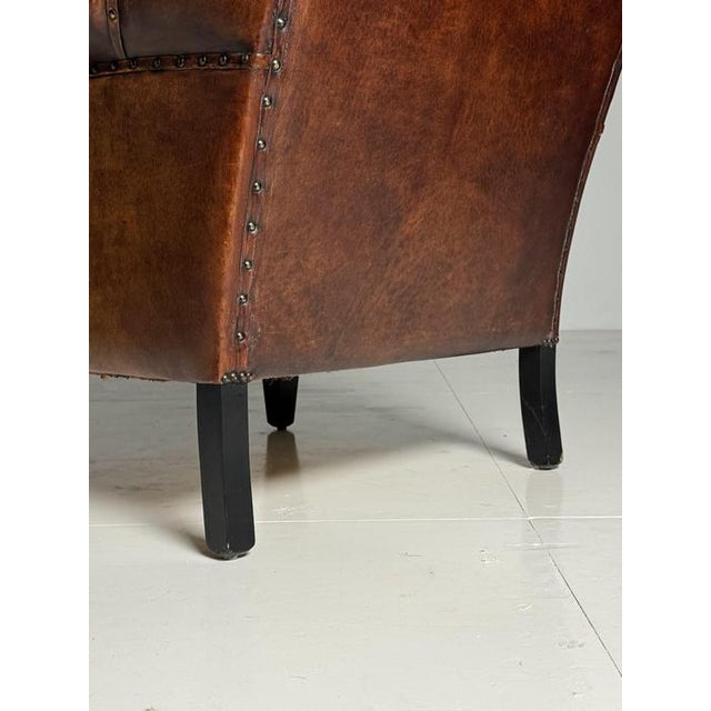 Fantastic sheepskin club chair / wingback armchair. High back. In perfect condition. Beautiful color and patina....