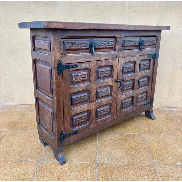 Rustic 1940s Spanish Rustic Carved Solid Wood Sideboard with Wrought Iron Details For Sale - Image 3 of 9