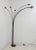 Floor lamp with seven arches of various sizes, produced in the 70s by the Italian company Relux Milan. The lamp has a...