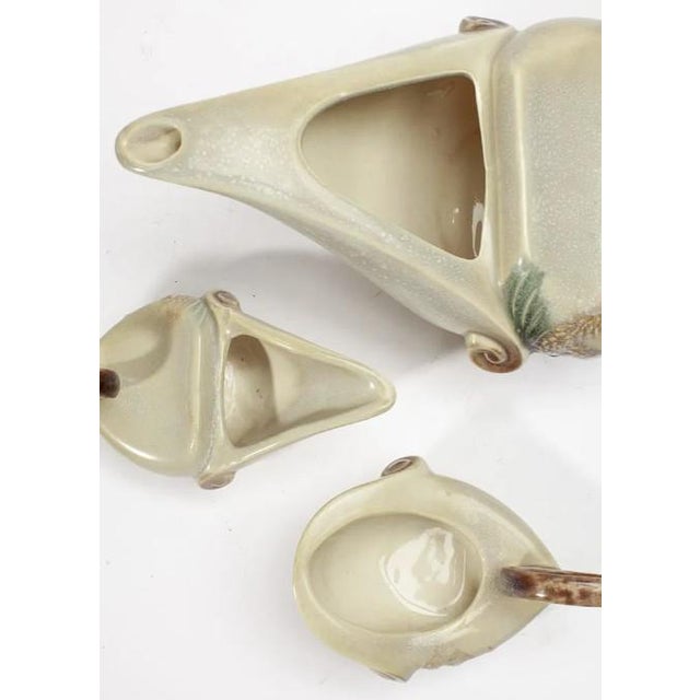 3 Piece Mid-Century Modern "Parchment and Pine" Aladdin's Lamp Tea Set was manufactured between 1950 and 1954. Made in...