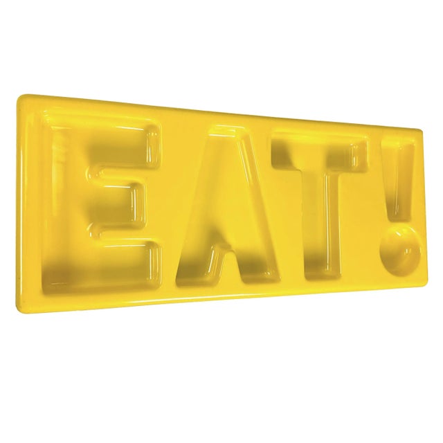 Vintage 1970s bright yellow molded plastic "Chatter Platter" designed by Arthur Umanoff for Custom Merchandise...