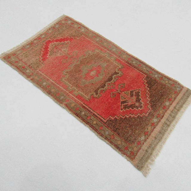 Vintage handknotted decorative mini rug from Konya region of Turkey. Approximately 50-60 years old. In very good condition.