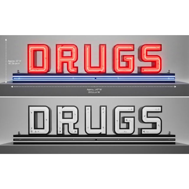This rare, visually commanding, circa-1940s "DRUGS" illuminated channel letter sign is an outstanding example of...