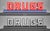 This rare, visually commanding, circa-1940s "DRUGS" illuminated channel letter sign is an outstanding example of...