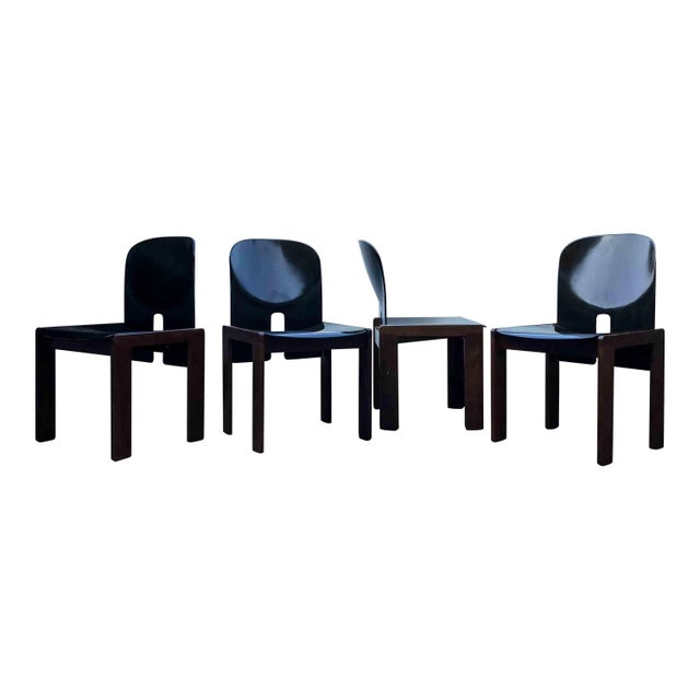 A set of four “121” chairs by Afra & Tobia Scarpa. The model 121 chair was produced by Cassina's employees molding...